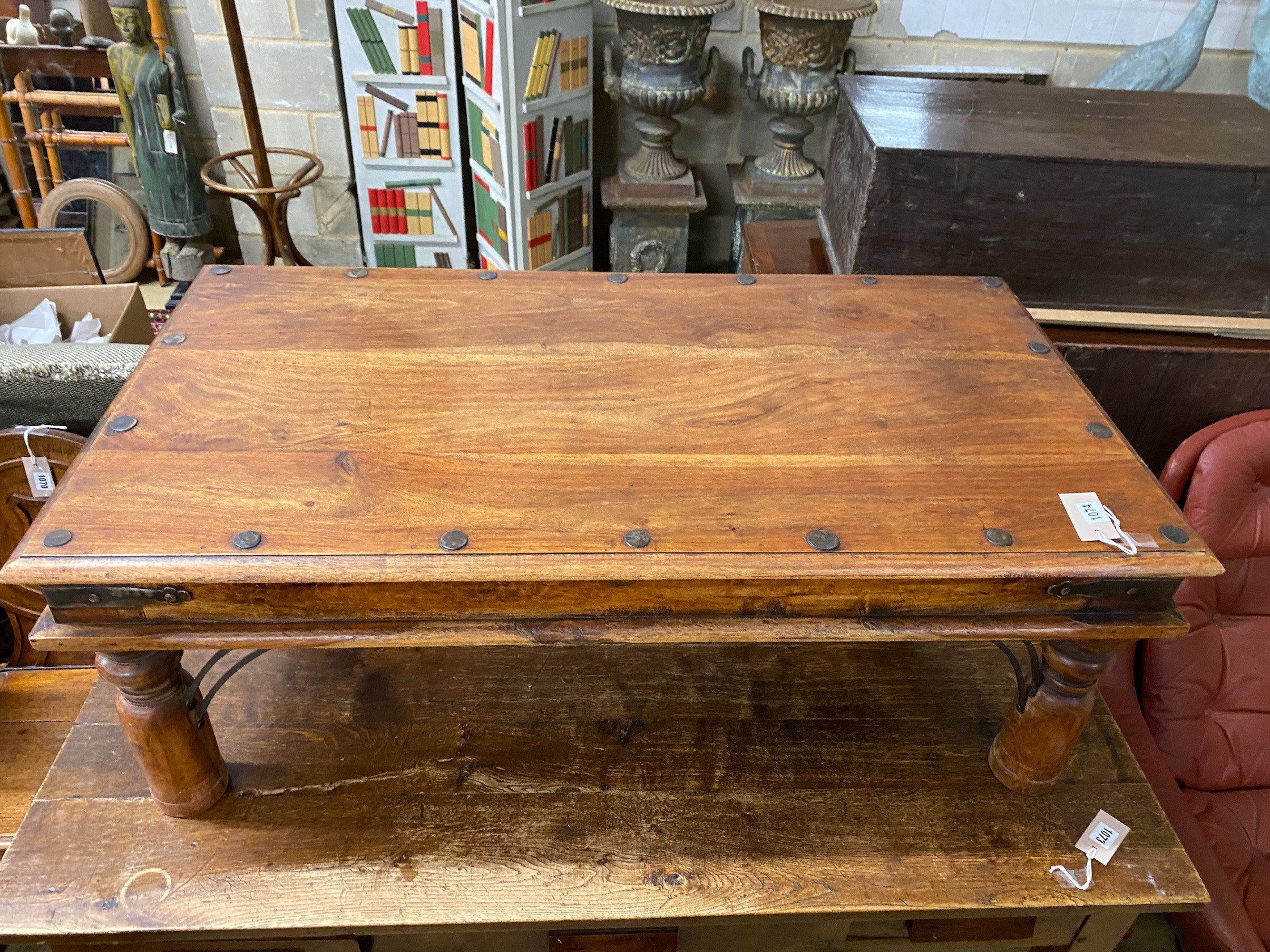 An Indonesian studded rectangular hardwood coffee table, length 108cm, width 60cm, height 40cm